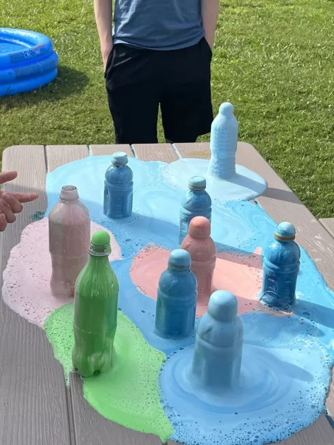 Experiment with slime overflowing from bottles